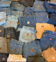 Load image into Gallery viewer, We stock between 65 to 100 pairs of CARHARTT PANTS at any one time. DM us