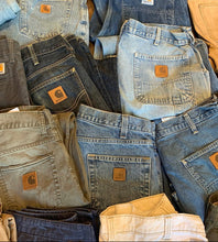 Load image into Gallery viewer, We stock between 65 to 100 pairs of CARHARTT PANTS at any one time. DM us